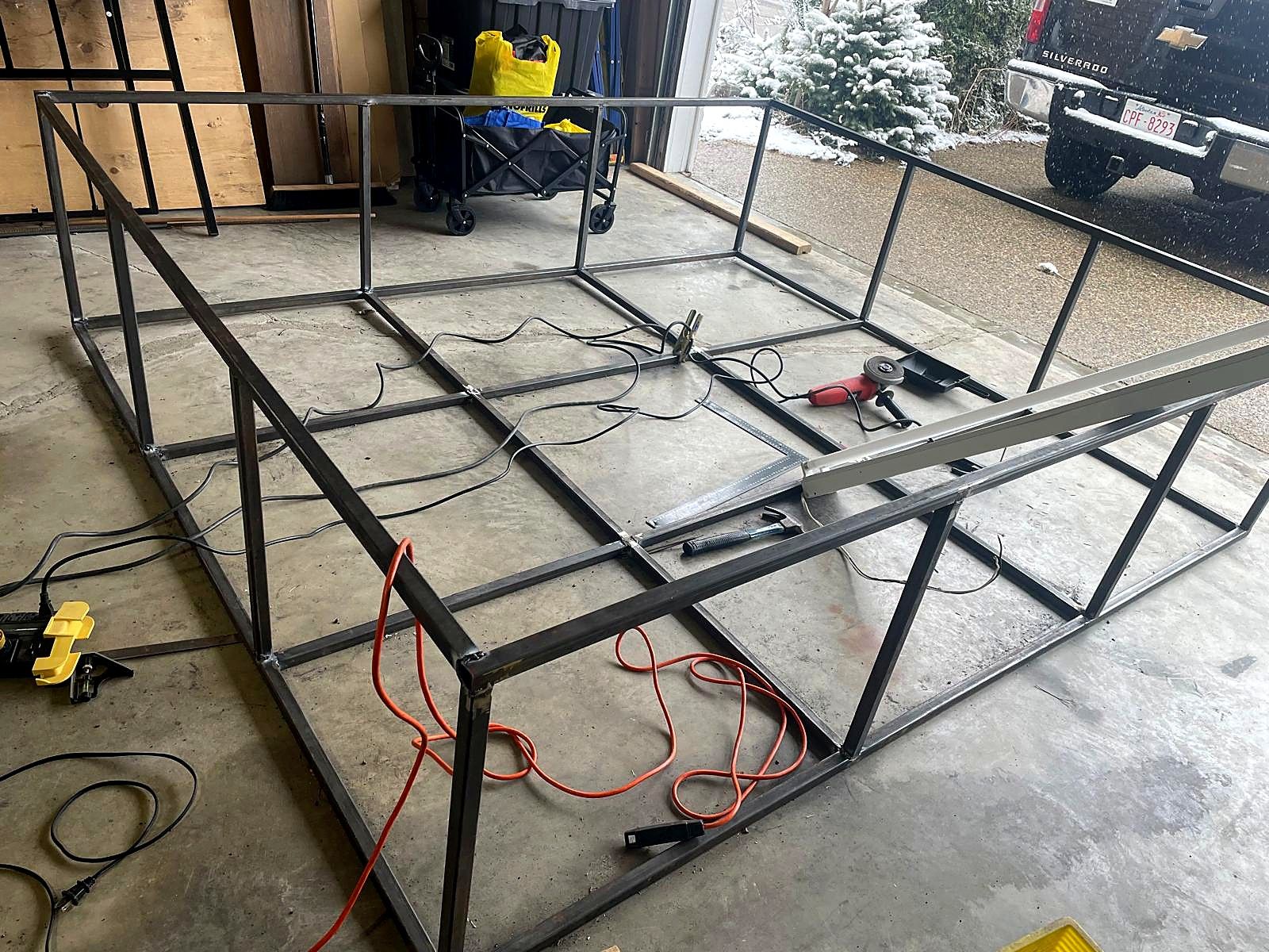 Welded steel sign-cabinet frame on the shop floor