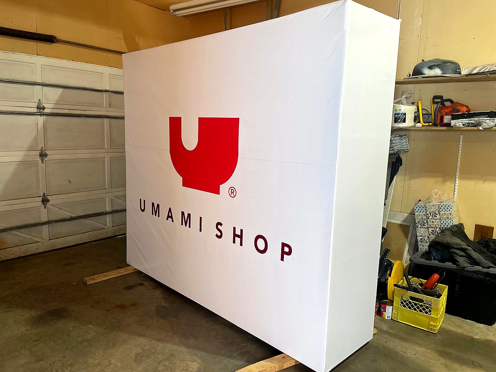 Finished Umami Shop sign cabinet standing in the shop